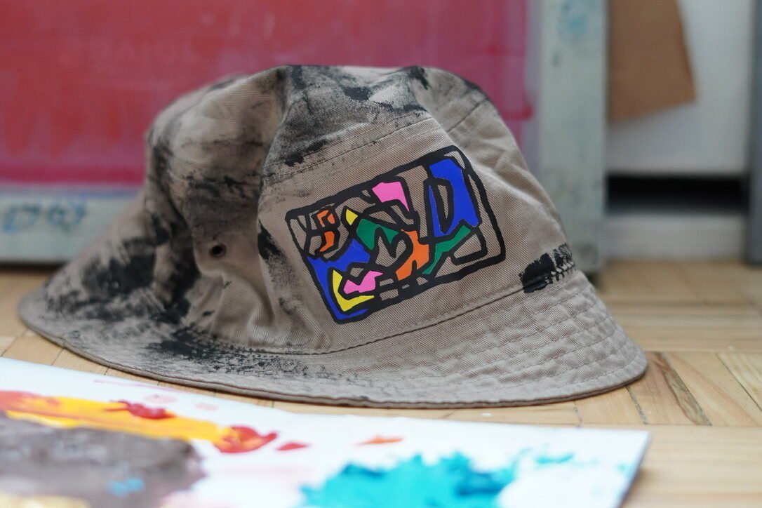 Hand-lettered hat names from the Montreal collection
